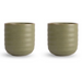 Two matching ribbed ceramic cups in a muted sage green color, shown side by side on a plain white background.