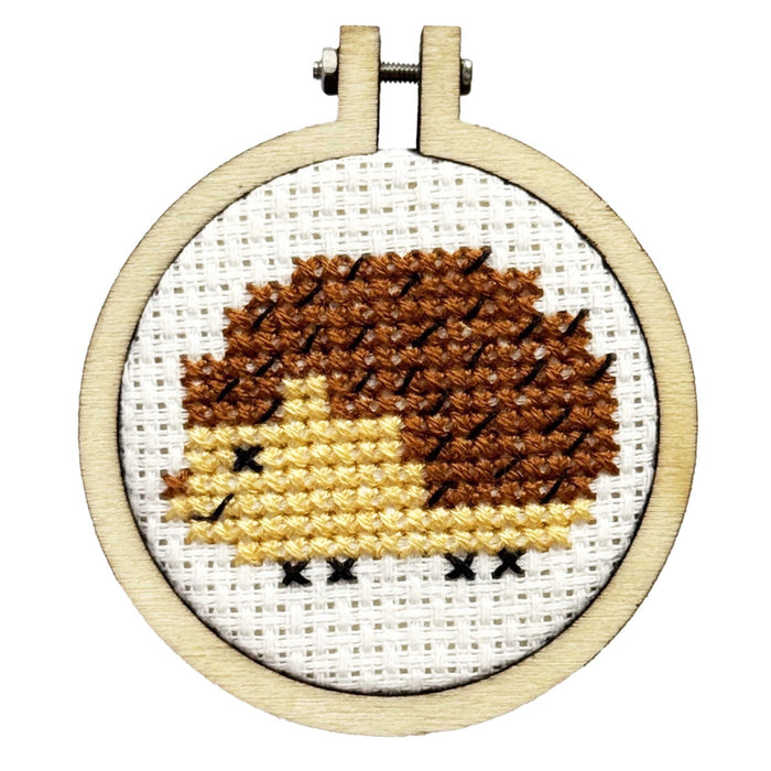 hedgehug mini cross stitch embroidery hoop with completed textile