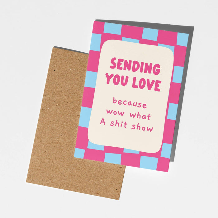 Card with text 'Sending you love because wow what a shit show' on a white background