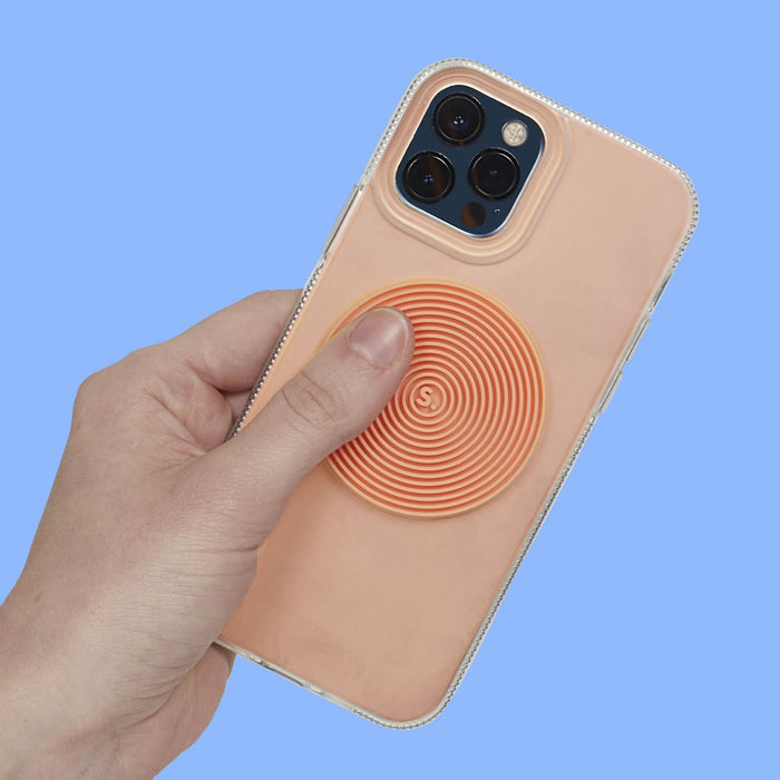 Hand holding a phone with a spiral design on a blue background