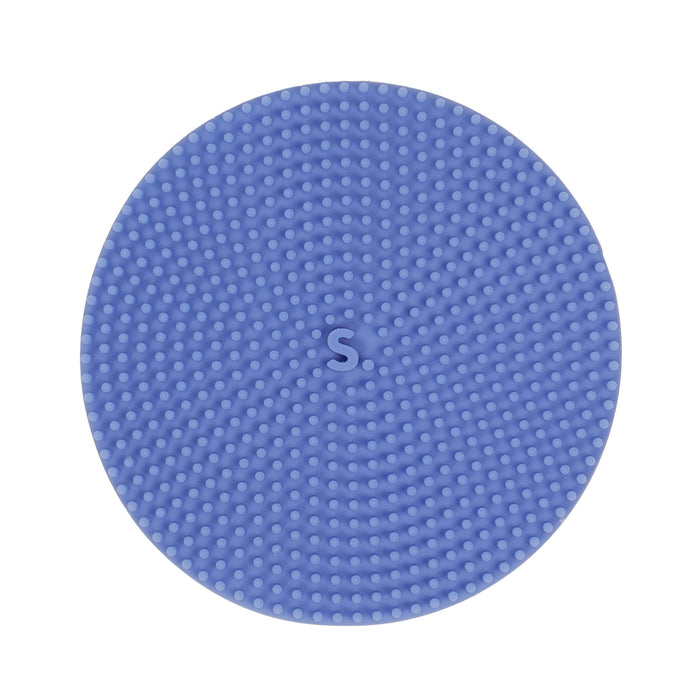 A round blue textured silicone mat with a raised letter 'S' in the center, shown on a plain white background.