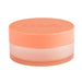 Coral-colored container with a lid on a white background