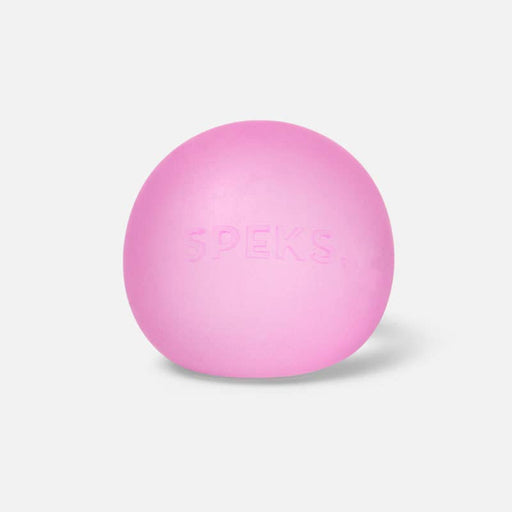 A pink spherical massage ball embossed with the brand name 'SPEKS' on a light gray background.