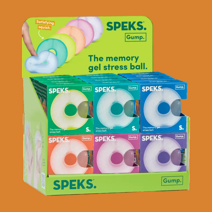 Display of Speks memory gel stress balls with colorful packaging.