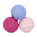 Three pastel-colored silicone balls on a white background