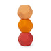 Stack of three geometrically shaped objects in orange, red, and brown on a white background