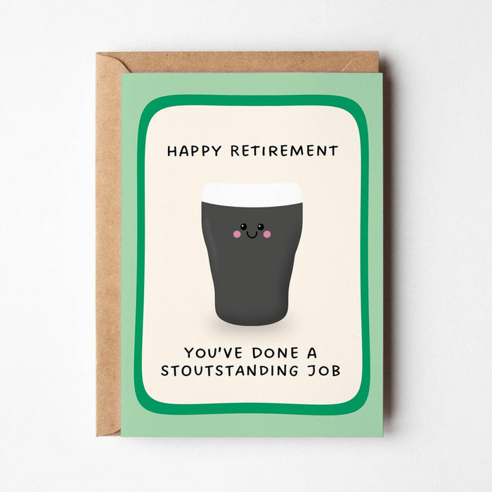 A retirement greeting card with a kraft envelope, featuring a light green border, a cartoon pint glass with a face, and the text 'HAPPY RETIREMENT YOU'VE DONE A STOUTANDING JOB' on a white background.