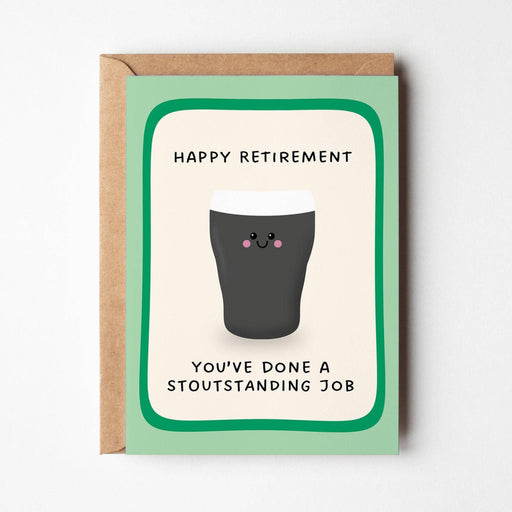 A retirement greeting card with a kraft envelope, featuring a light green border, a cartoon pint glass with a face, and the text 'HAPPY RETIREMENT YOU'VE DONE A STOUTANDING JOB' on a white background.