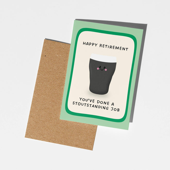 A retirement greeting card with a light green border and a cartoon pint glass, shown with a brown kraft envelope on a light gray background.