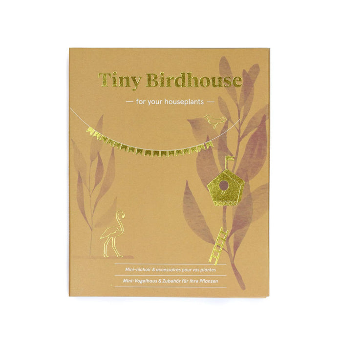 Product packaging for 'Tiny Birdhouse' with illustrations of a bird and a birdhouse on a brown background.