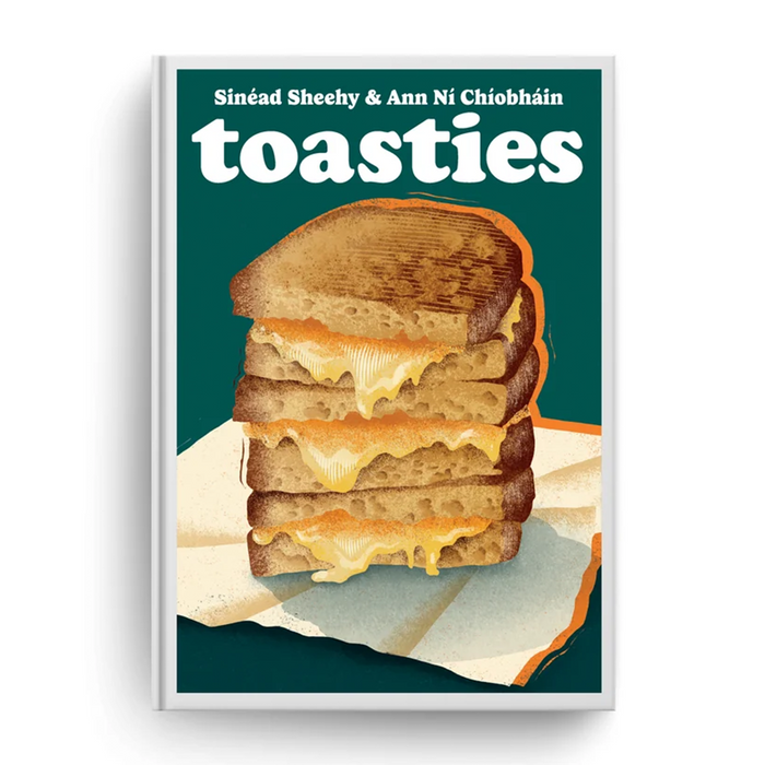 A hardcover book titled 'toasties' by Sinéad Sheehy & Ann Ni Chiobháin, featuring a dark teal cover with a stylized illustration of a stacked grilled toast sandwich on a white page-like shape.
