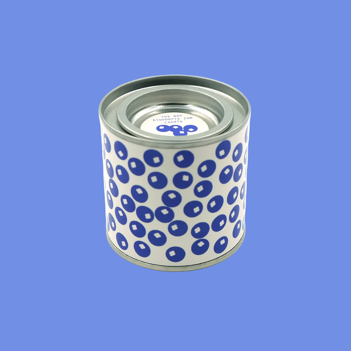 Cylindrical container with blue dot pattern on a white background