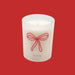White candle with a red bow design and 'to:from' text on a white background