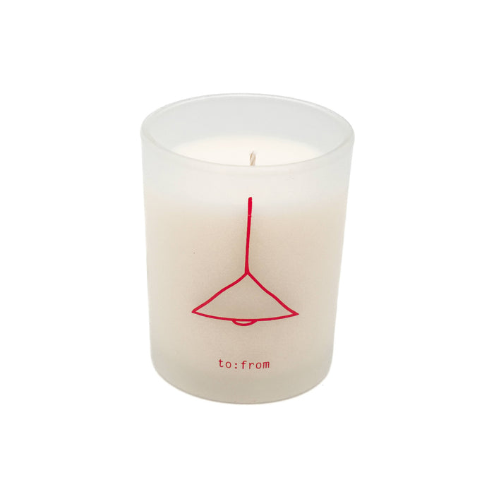 Candle with a red lamp design and 'to:from' text on a white background