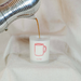 Coffee being poured into a frosted glass with a red mug outline and 'to: from' text on a white background.