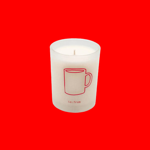 Candle with a red mug design and 'to:from' text on a white background