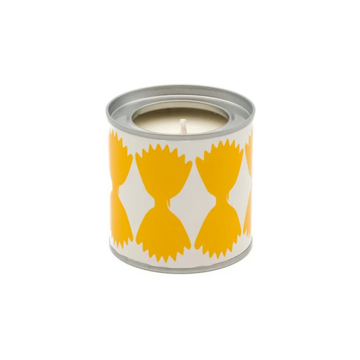 Candle in a decorative tin with orange patterns on a white background