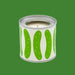 Candle in a can with green pattern on a white background