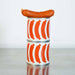 Two stacked cylindrical containers with a red sausage pattern on a white background