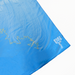 Blue towel with map of the Wild Atlantic featuring white lines and text on a white background