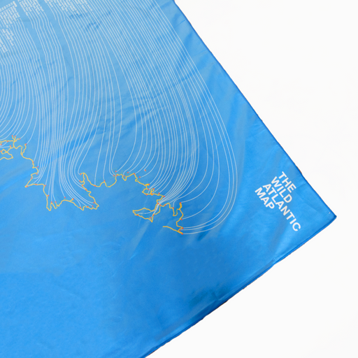 Blue towel with map of the Wild Atlantic featuring white lines and text on a white background