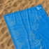 Blue map towel on sand