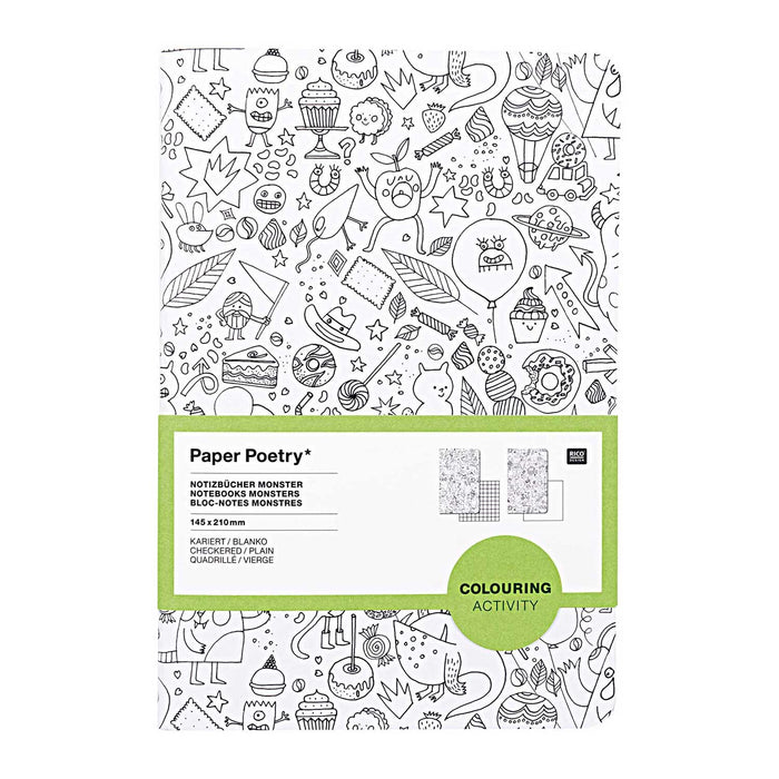 notebook with black line cartoon drawing of monsters on the cover and white and green band