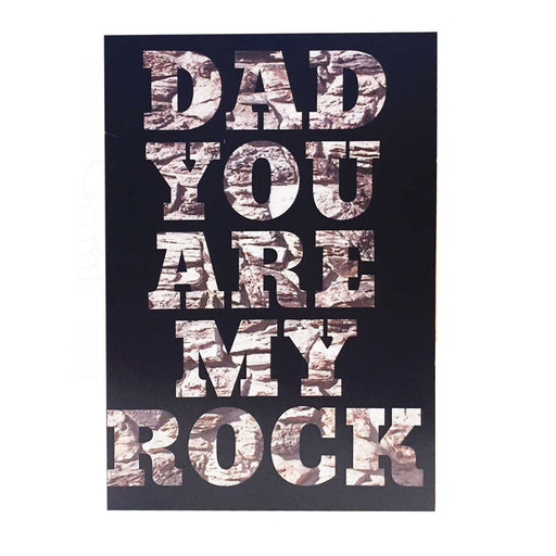 fathers day card with white envelope on white background. black card with large text with grey rock pattern on.