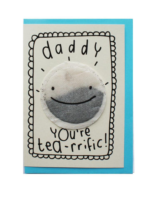 fathers day card on white background. white card with an illustrated frill border. therr is a tea bag in the middle with a face drawn on and it is surrounded by text that reads 'daddy you're tea-rrific'