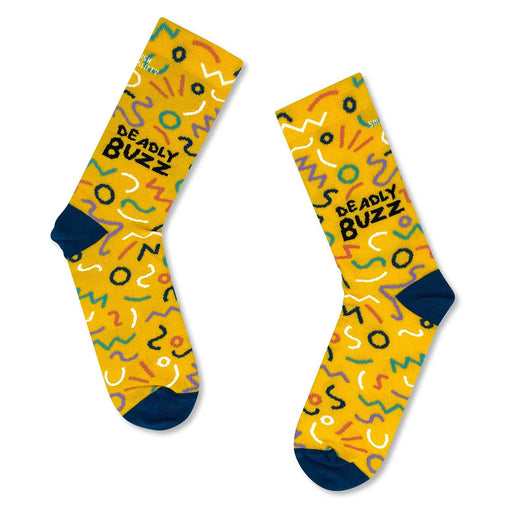 pair of yellow socks with blue at the toes and heall. socks has squiggly lines and circles in green, lilac, white and red and deadly buzz written on hte side