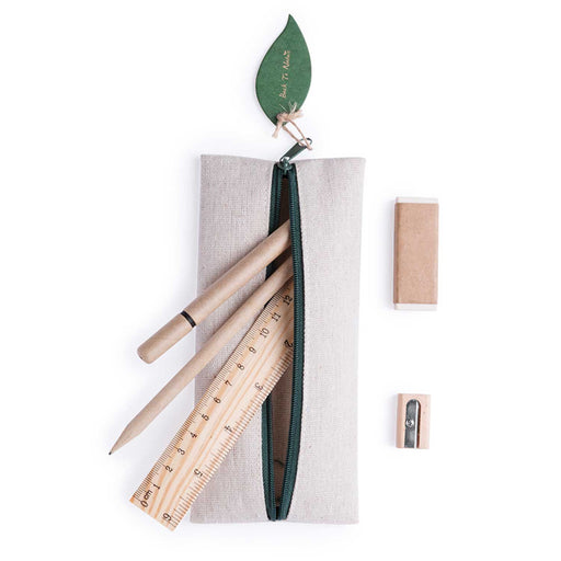 Canvas pencil case with green zip and leaf shaped tag with wooden ruler, pen amd pencil in case and pencil sharpener and eraser to right of pencil case