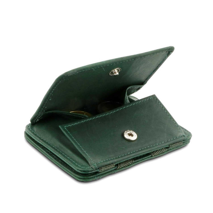 green purse wallet open with two coins showing