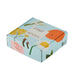 place blue gift box with The Nature of Things written on top and illustrations of a daisy, orange, rose and white and yellow flowers