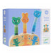 Popop Pidoo pop up game box, purple box with illustration of wooden base with a green bear, orange rabbit and blue cat painted on it with matching coloured wooden sticks sticking into base each with a corresponding green bear head, orange rabbit head and blue cat head