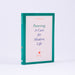 pottering,, a cure for modern life. book standing up on white background